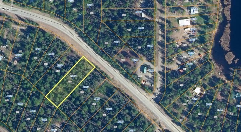 Nearly 3/4 Acre Lot on Caswell Lakes Road - Power - Developed Area by Lakes